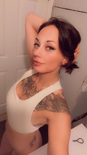 Fun size Busty Brunette bombshell